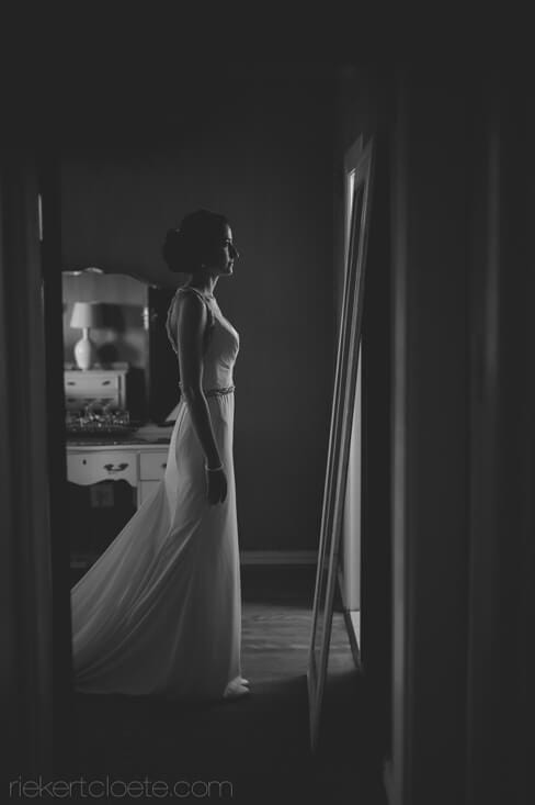 Bride in front of mirror