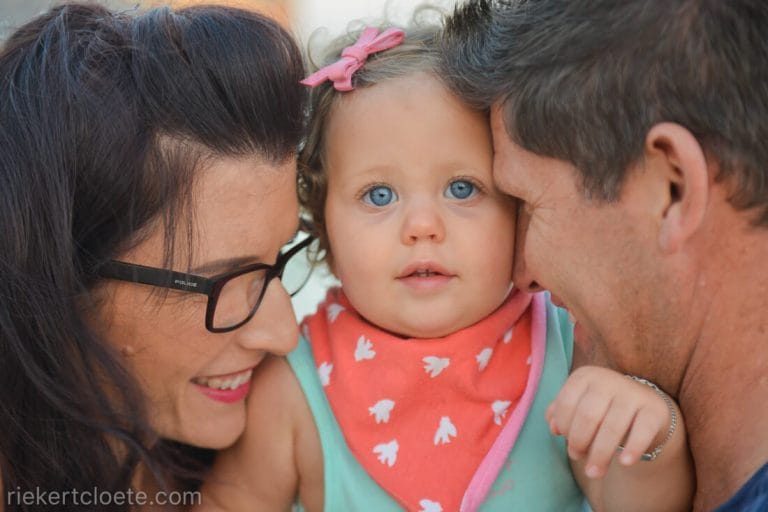 Mom and dad enjoying babygirl