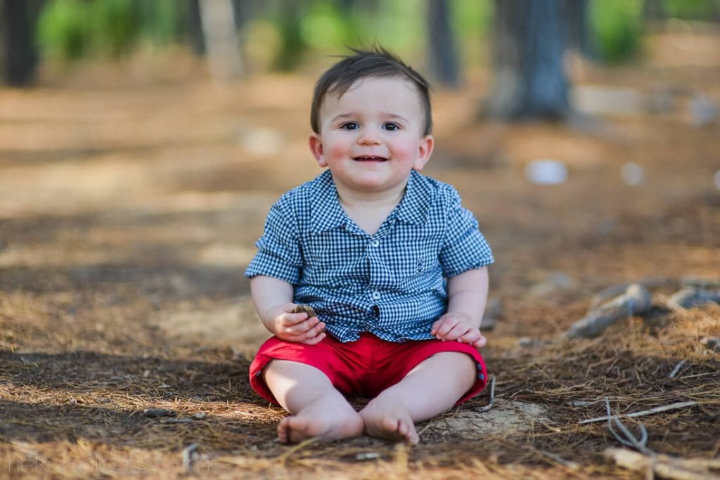 Baby sitting in forrest