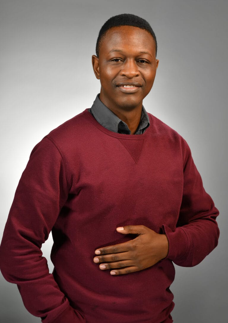 man with red pullover