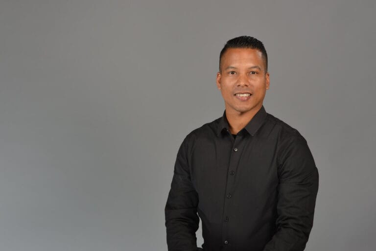 Corporate headshot taken at Cape town company with grey background