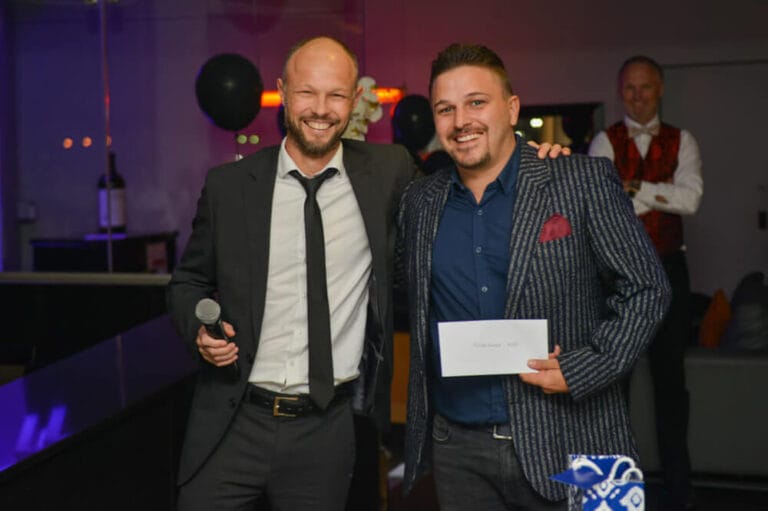 Man receiving award at End of year function