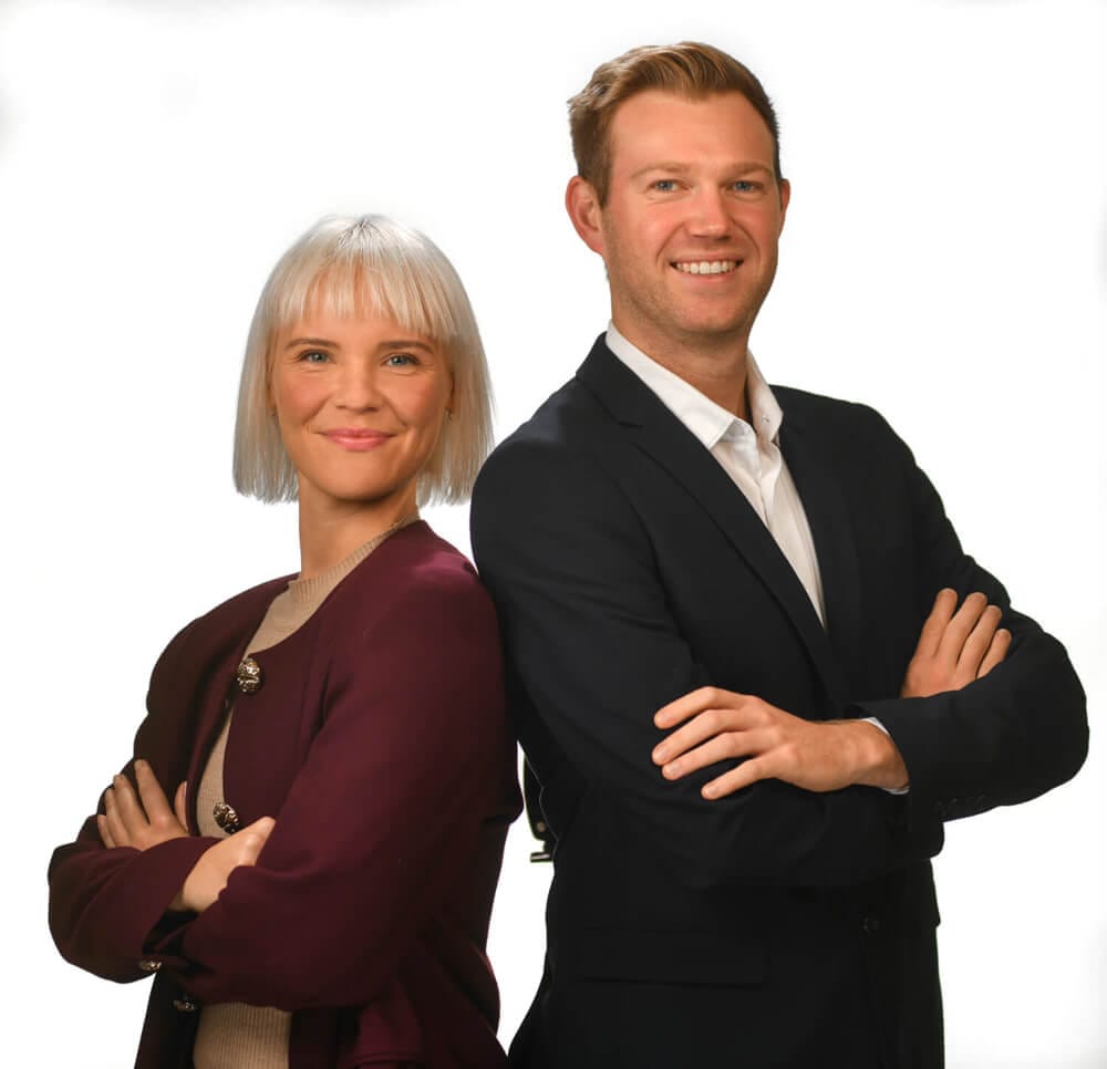 two people on white wall