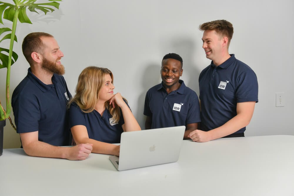 staff around a computer
