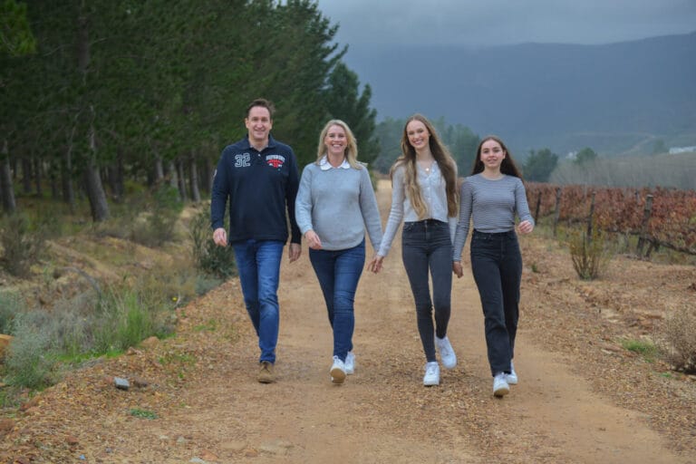 family walking during a photo shoot