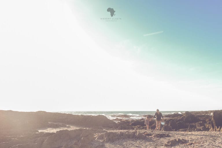 Family on the rocks during a family shoot in Cape Town photography session