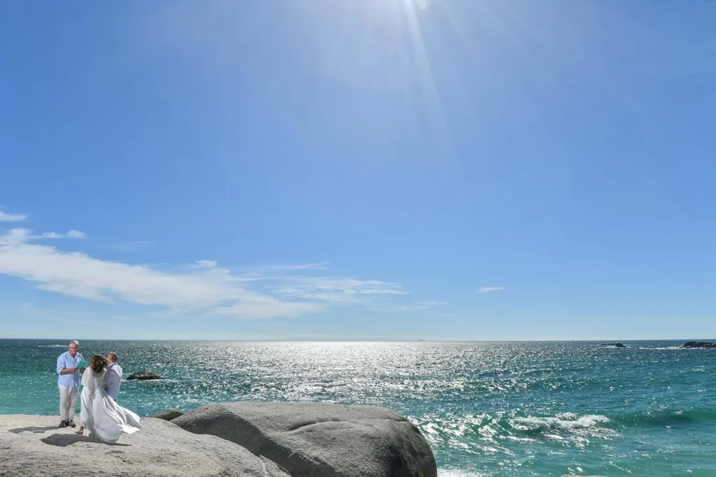 camps bay beach couple ocean sunny portrait during elopement wedding