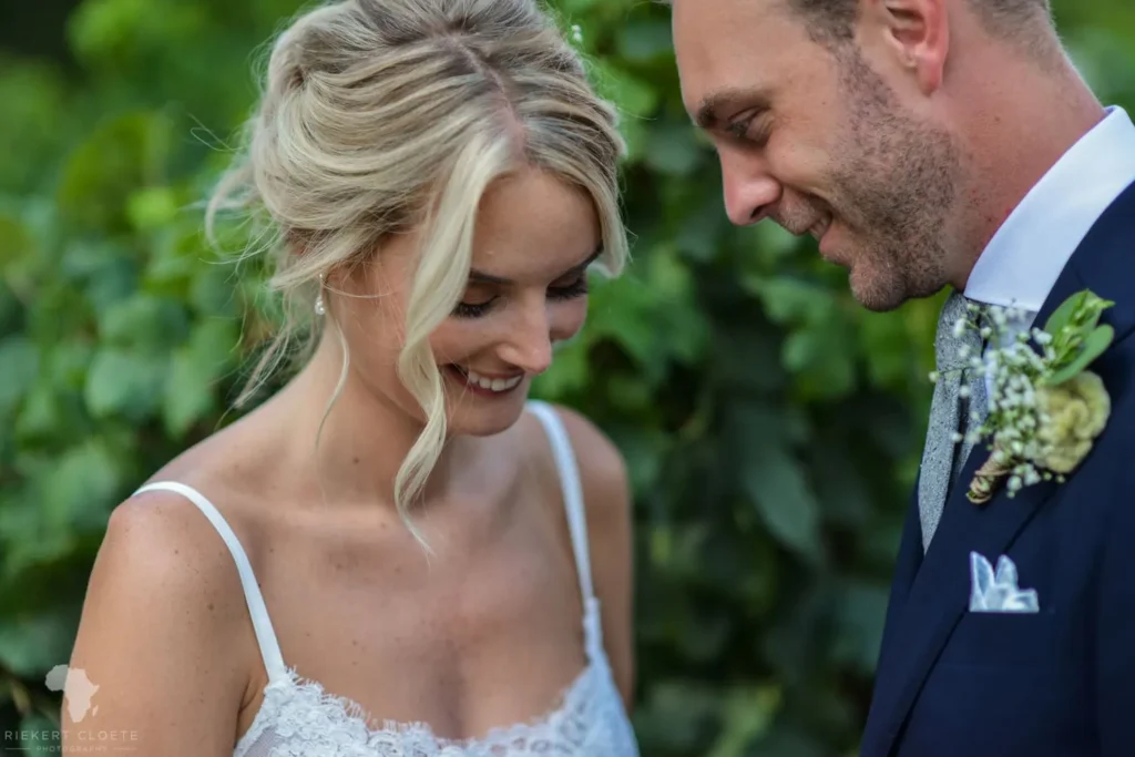 couple close portrait lace gown ivy backdrop