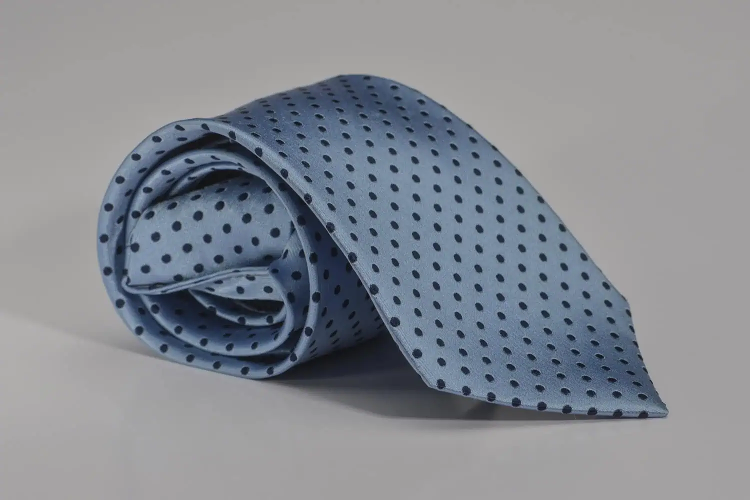 blue polka dot silk necktie folded product photography cape town