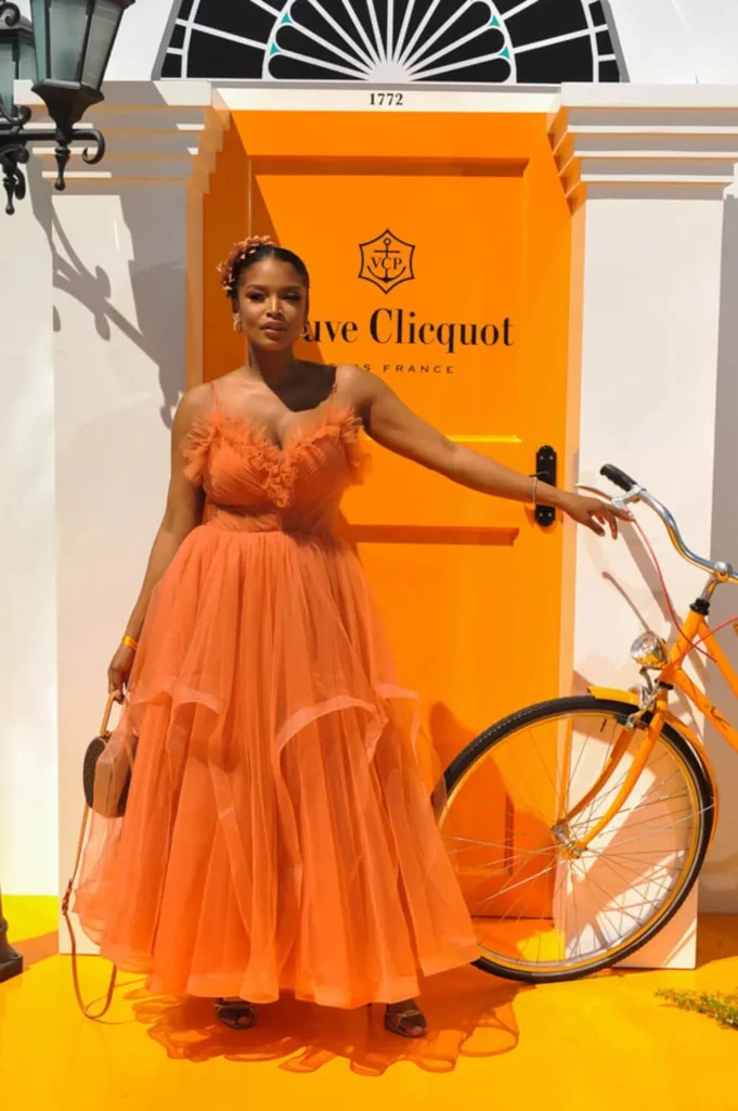 branded event photographer cape town portraits 21 woman orange dress veuve clicquot