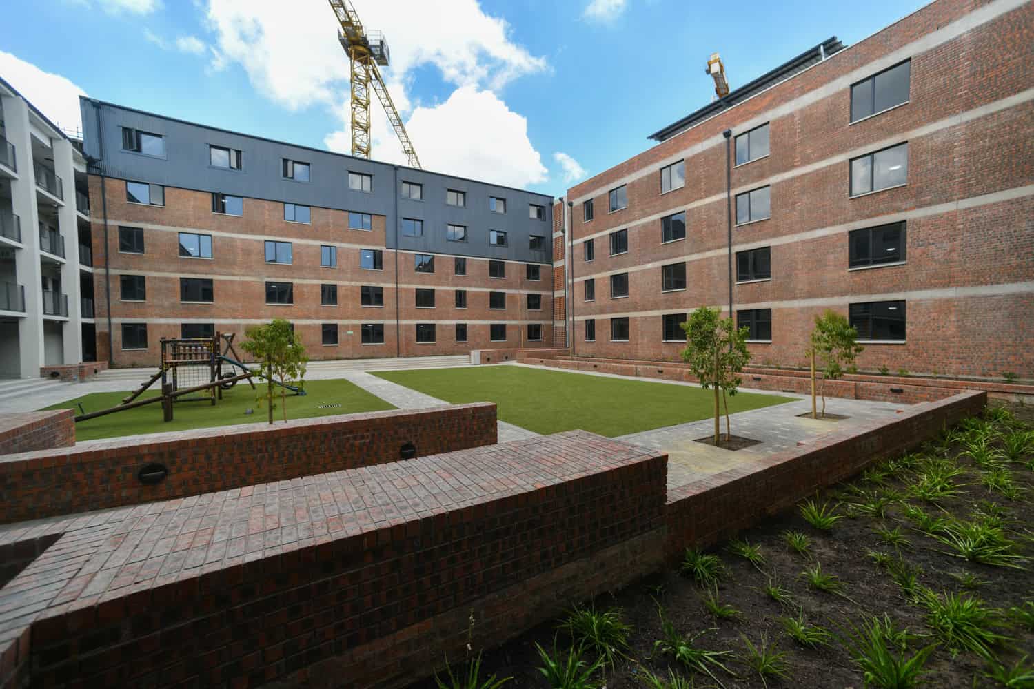 contemporary brick apartment complex playground architectural photography cape town