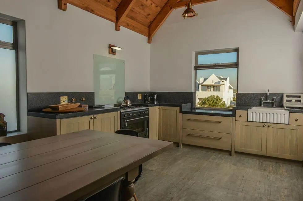 contemporary kitchen vaulted timber ceiling island interior photography cape town