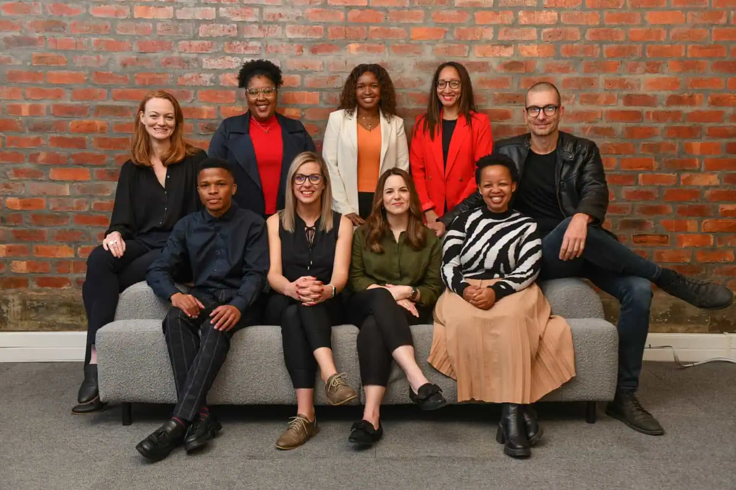 corporate team indoor brick wall team photography cape town