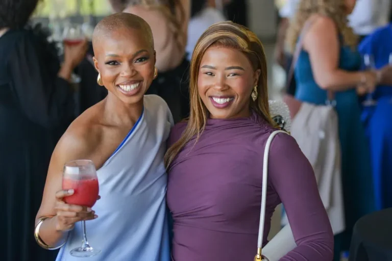 end of year event photographer cape town 11 two women cocktail party