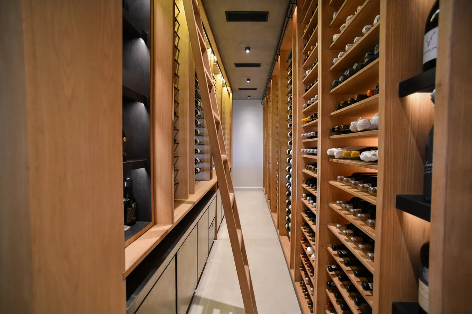 luxury wine cellar timber shelving custom racking interior photography durbanville