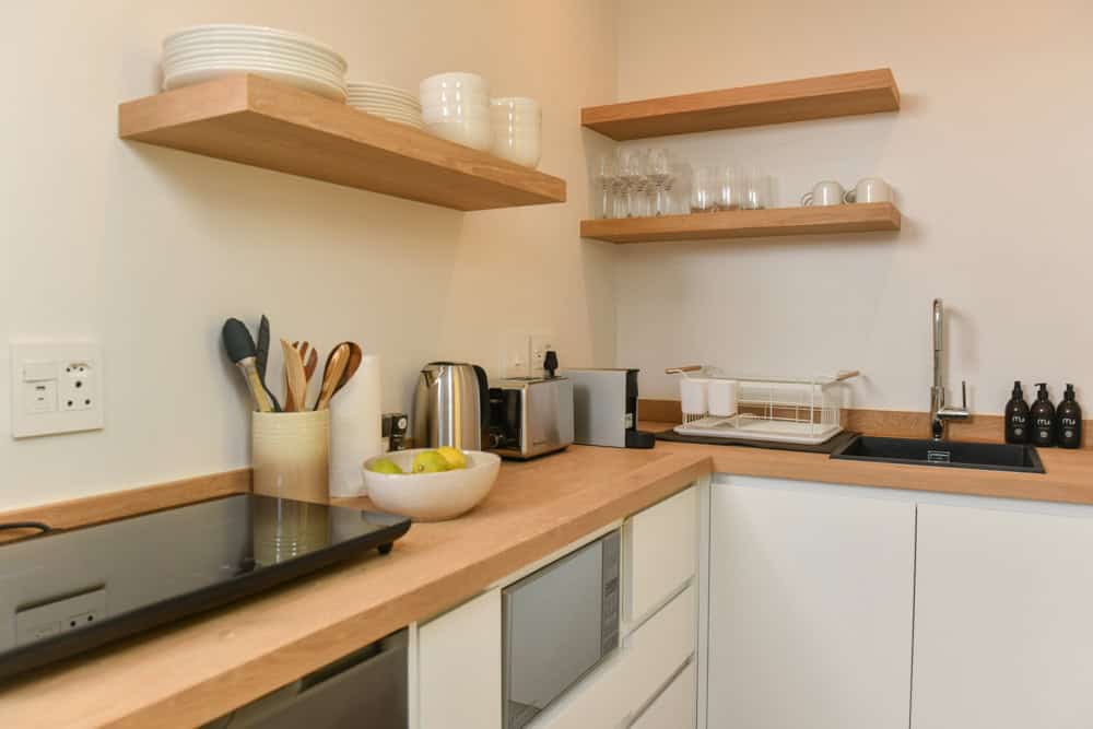 modern kitchen timber shelving stainless appliances interior photography durbanville