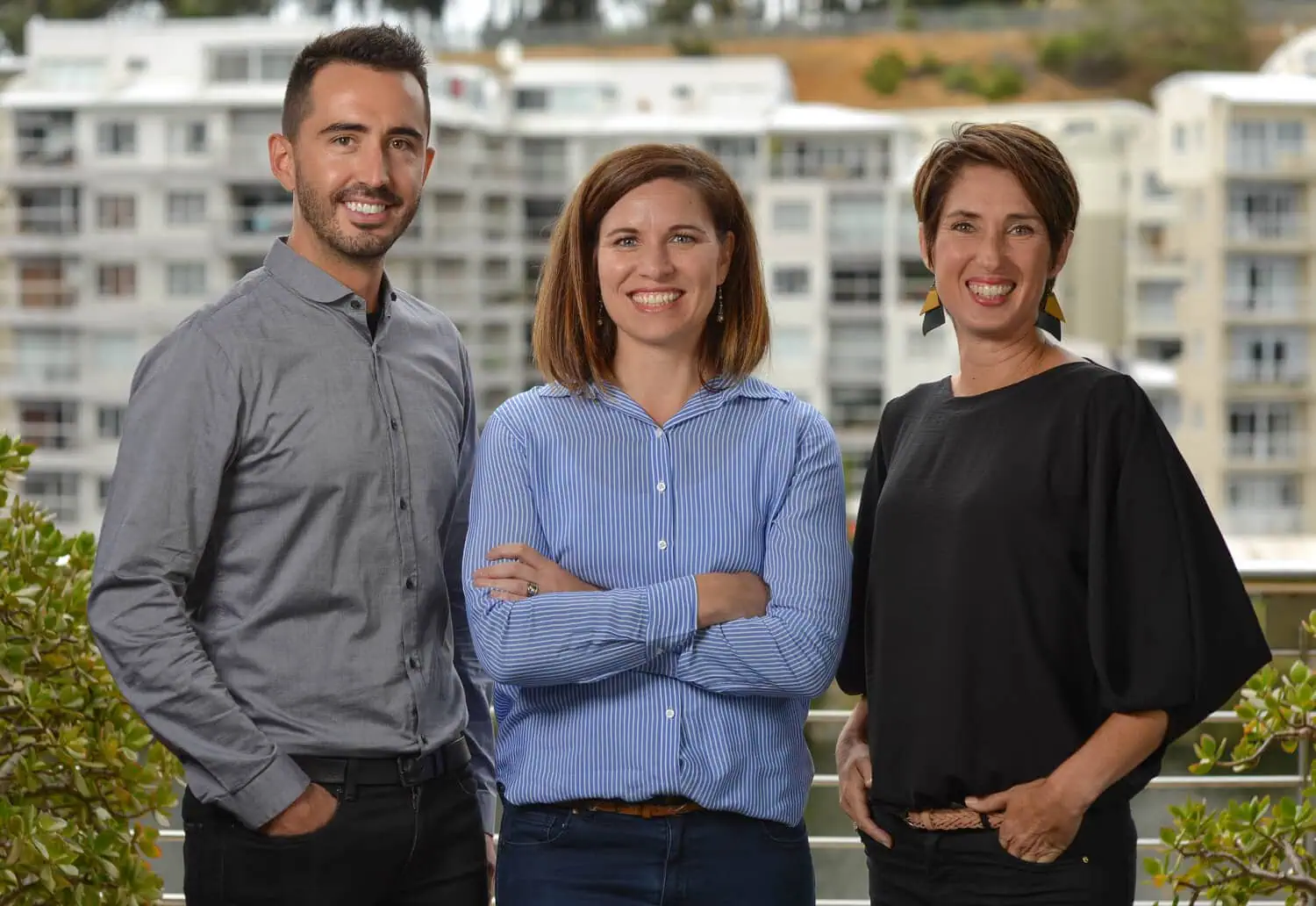 three professionals rooftop mountain views team photography durbanville