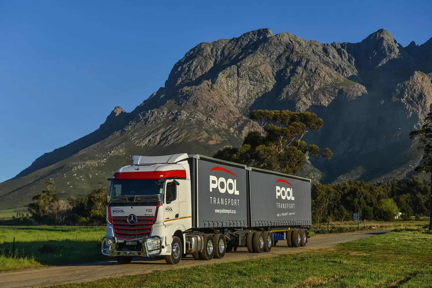 transport logistics photographer cape town branded truck mountain landscape