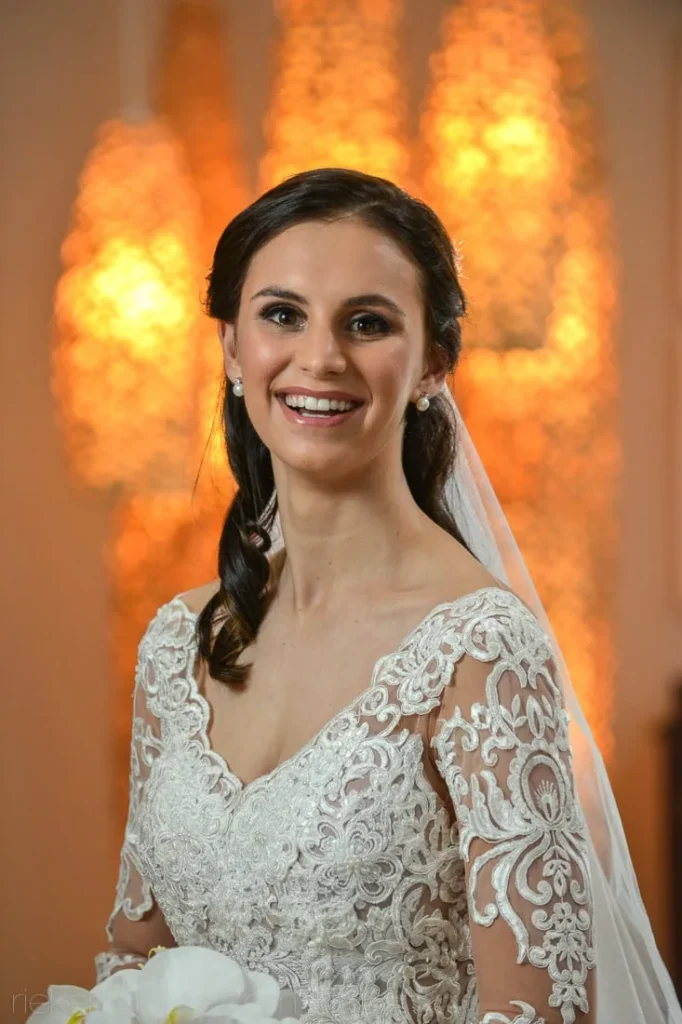 Bona Dea bride embroidered lace sleeve gown orchid bouquet