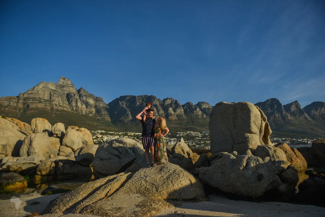 Family photographed on the beach at Camps Bay, Cape Town