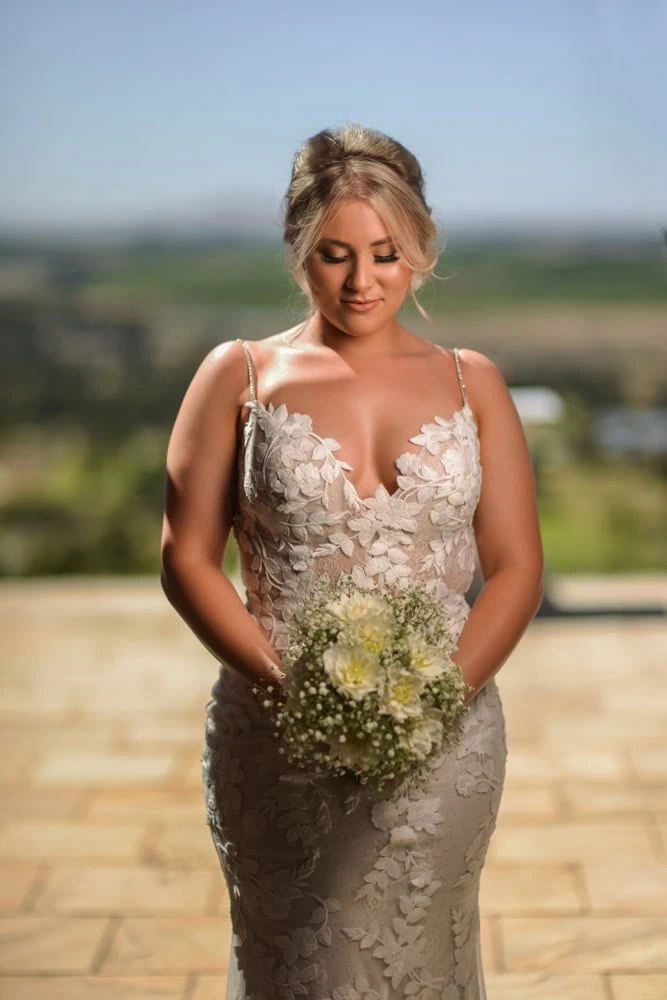 Landskap bride champagne floral applique gown vineyard view