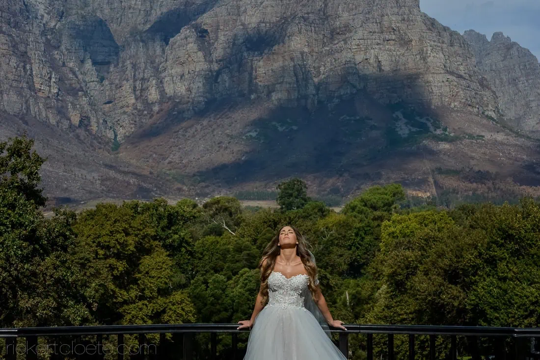 Molenvliet bride beaded ballgown head back mountain view