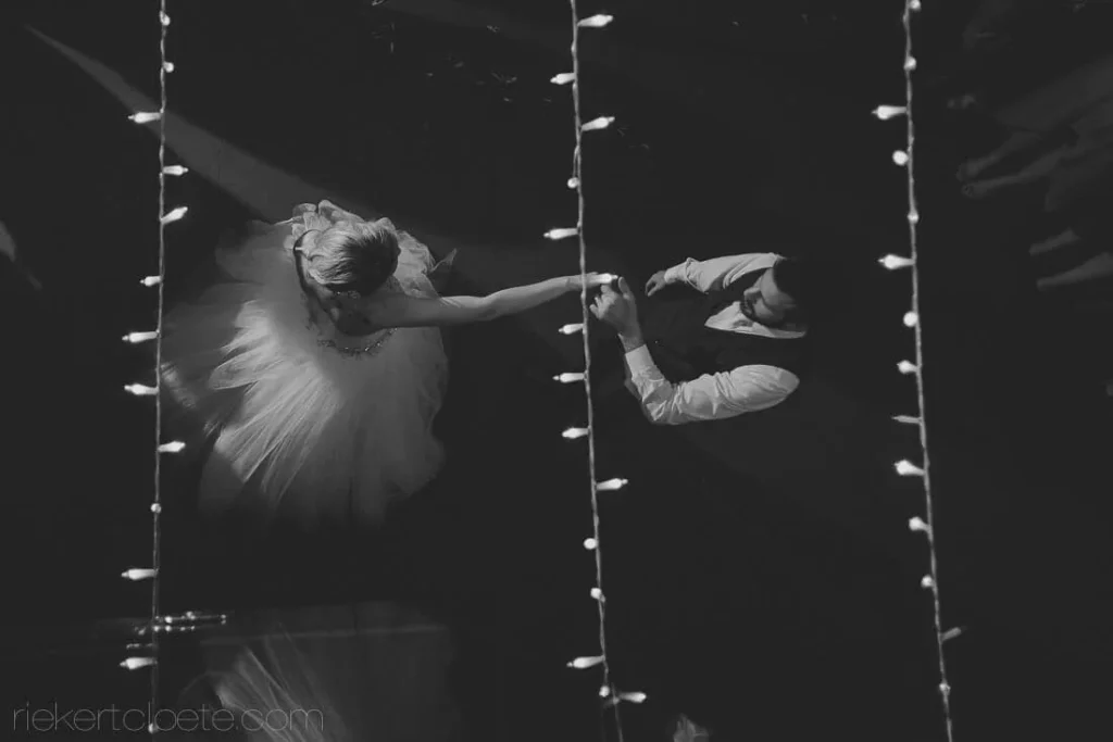 aerial first dance couple fairy light curtains