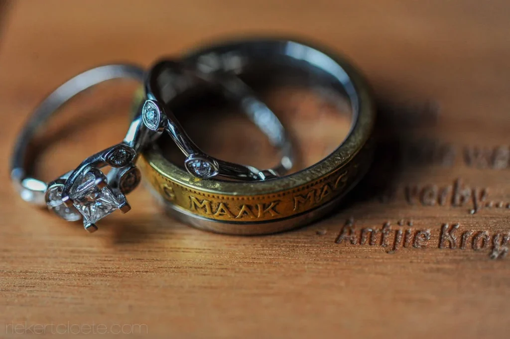 afrikaans inscription gold band diamond solitaire