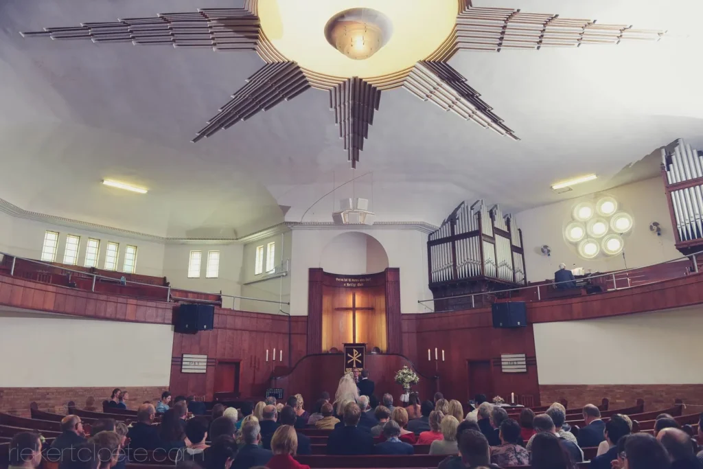 art deco church ceremony sunburst ceiling pipe organ