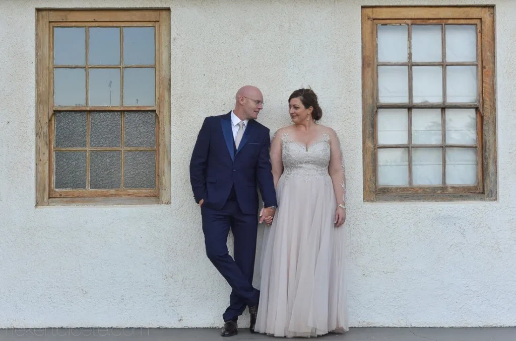 beloftebos couple portrait navy suit blush gown