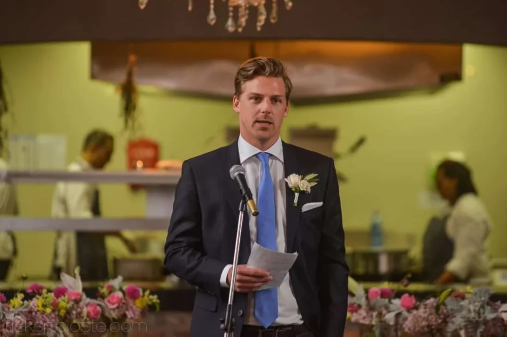 best man speech microphone navy suit wedding