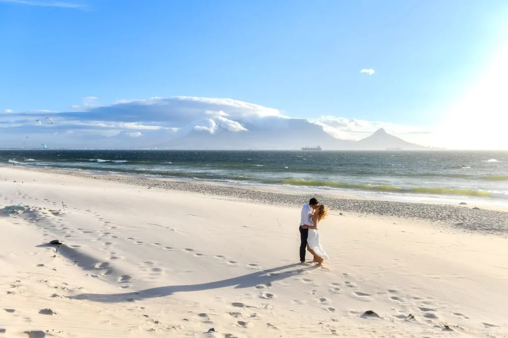 blouberg beach couple kissing table mountain view