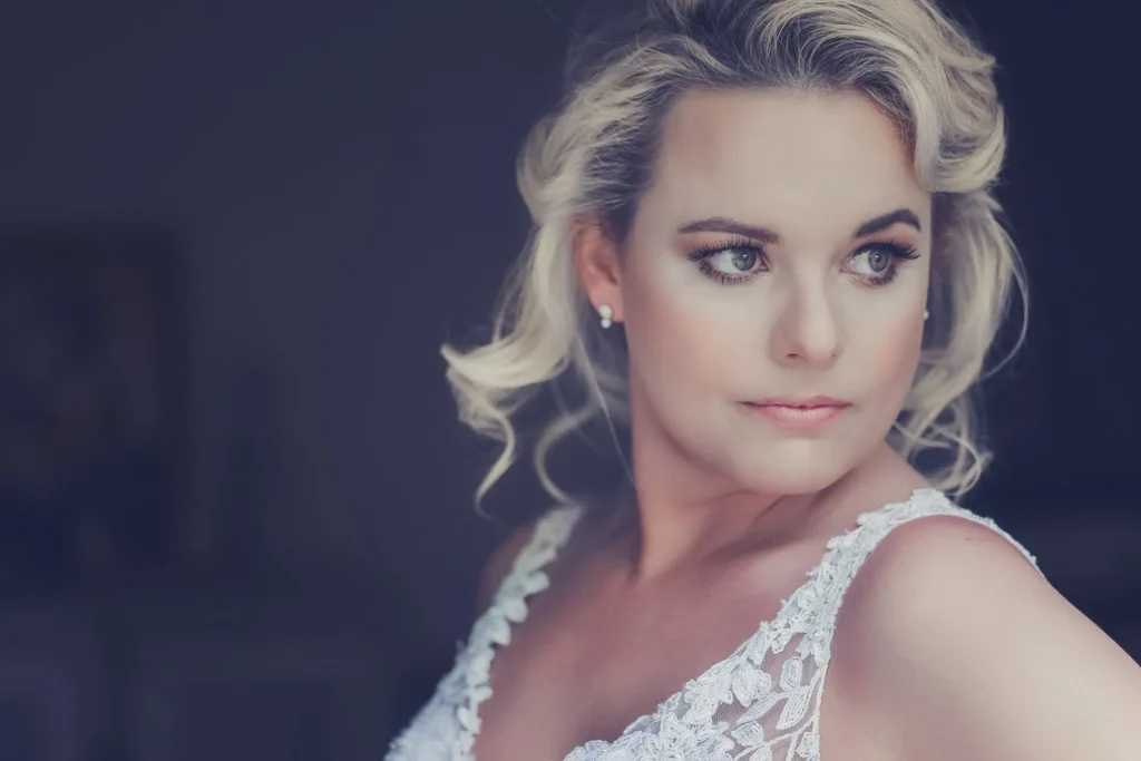 bride blonde short curled updo dramatic portrait