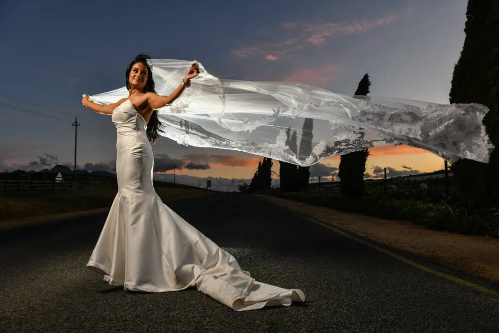 bride brenaissance satin gown veil sunset road