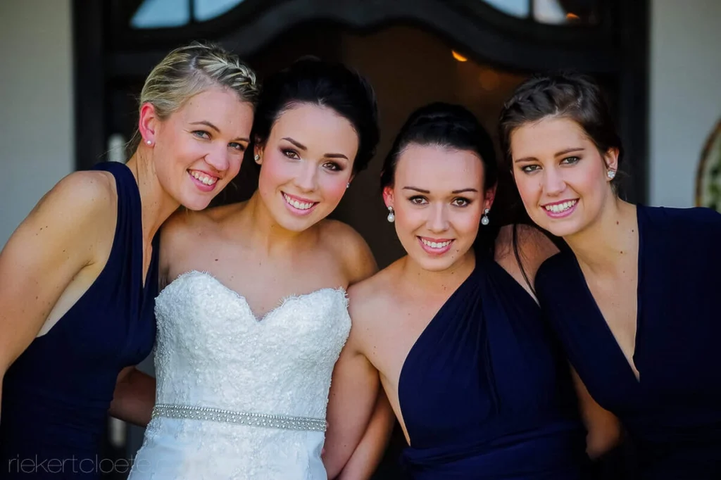 bride bridesmaids navy dresses close portrait