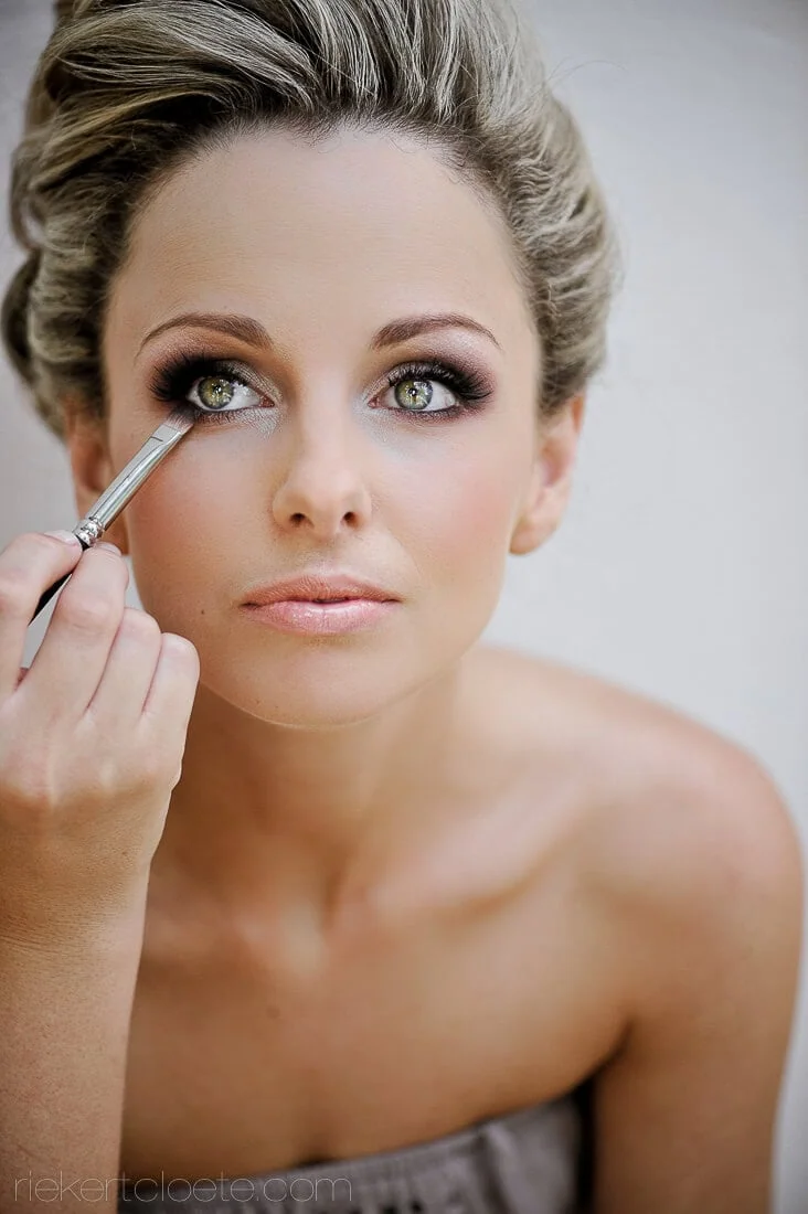 bride eye makeup applied closeup portrait bridal preparations