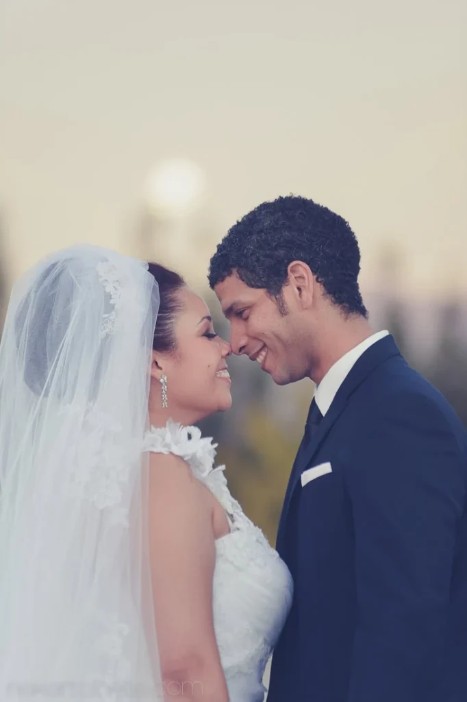 bride groom forehead touch sunset portrait