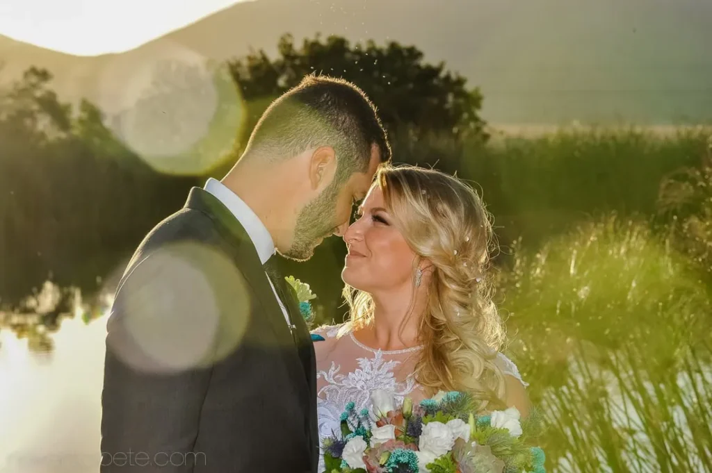 bride groom portrait mountain wetland golden hour