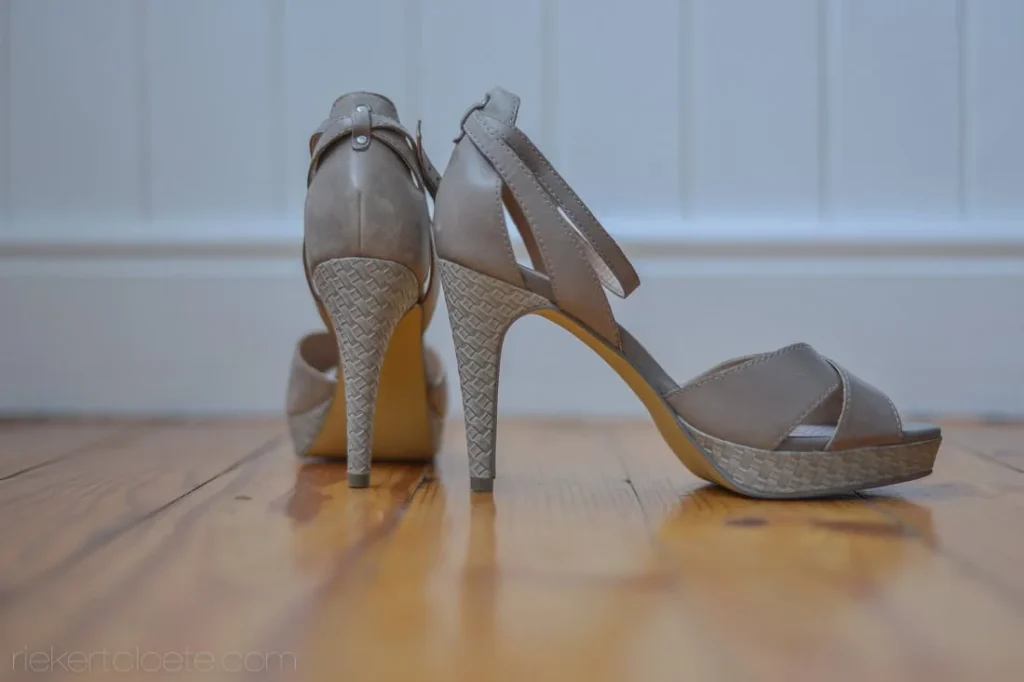 bride nude platform heels woven detail wooden floor