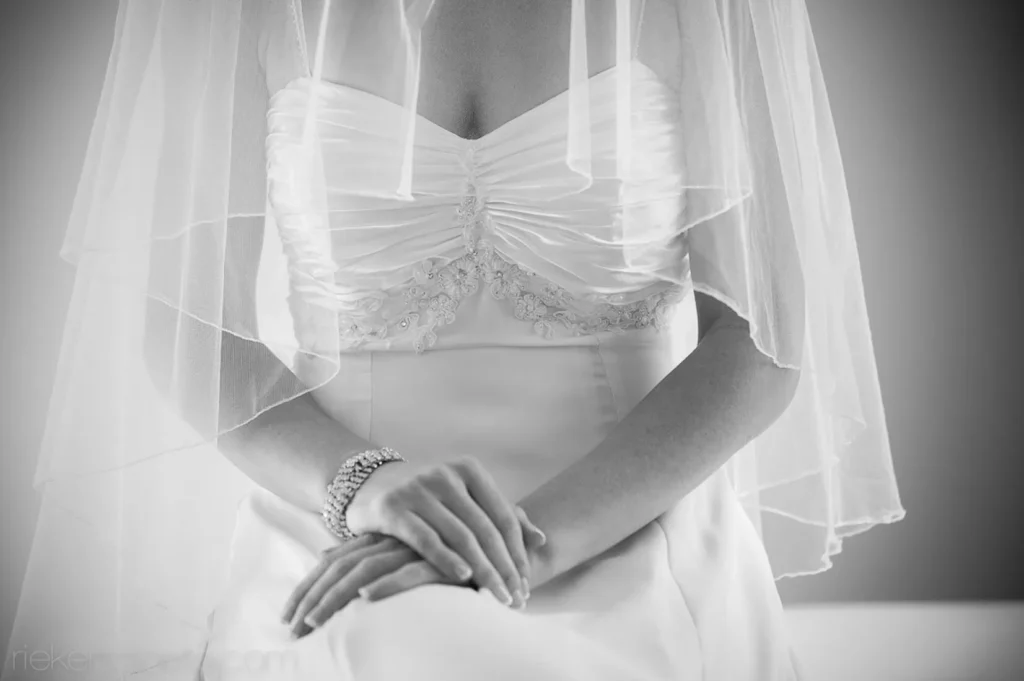 bride ruched bodice crystal bracelet veil hands portrait