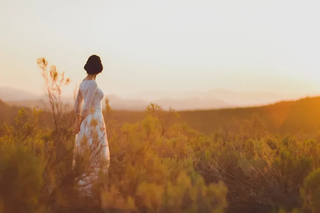 bride white dress golden fynbos mountain sunset