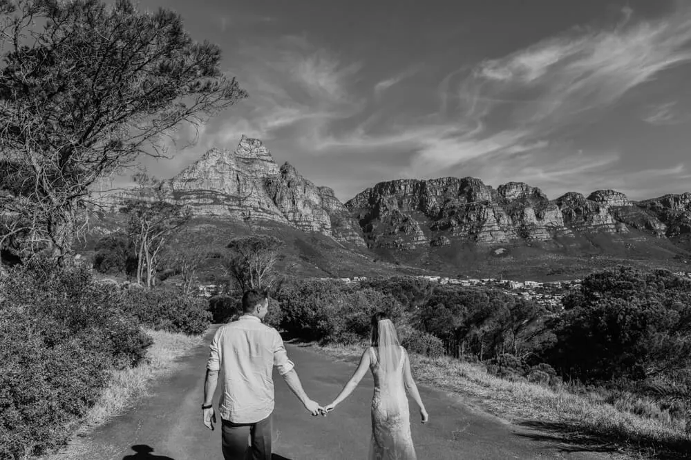 cape town elopement couple mountain road black white