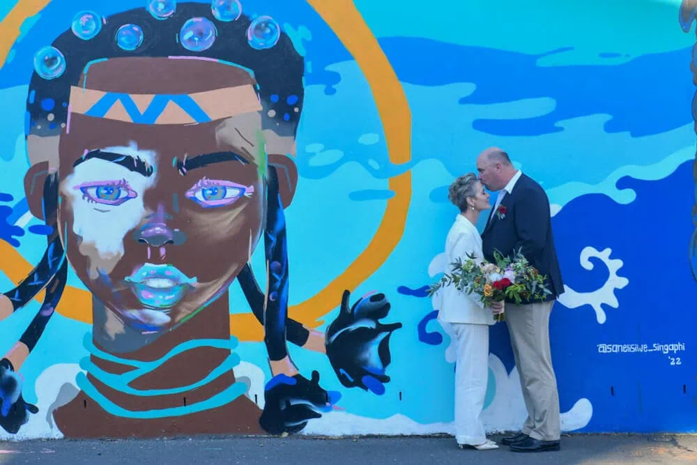 cape town elopement couple street art face mural