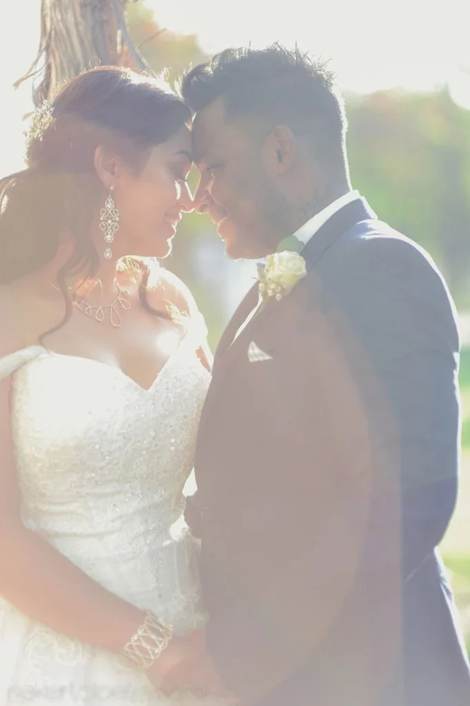close up couple golden backlight lace wedding portrait