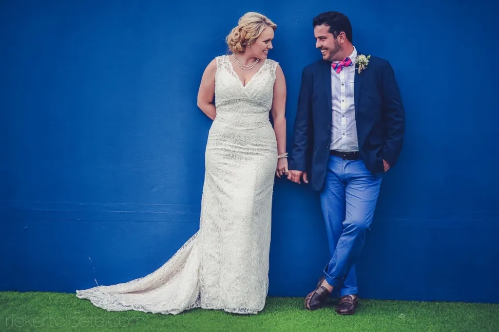 couple cobalt blue wall lace gown pink bowtie