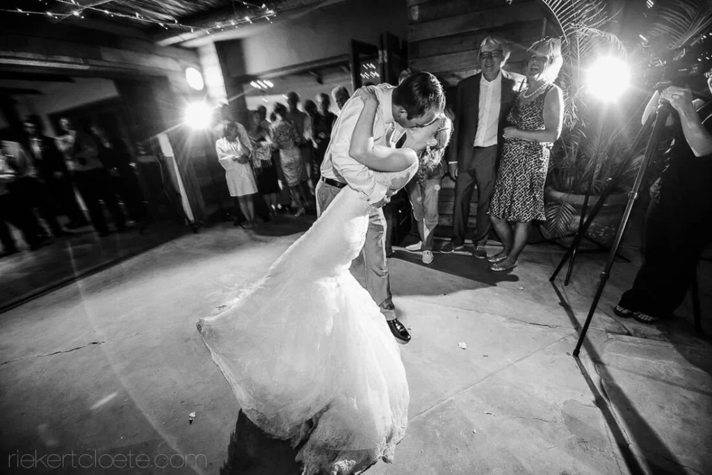 couple dramatic dip first dance mermaid gown