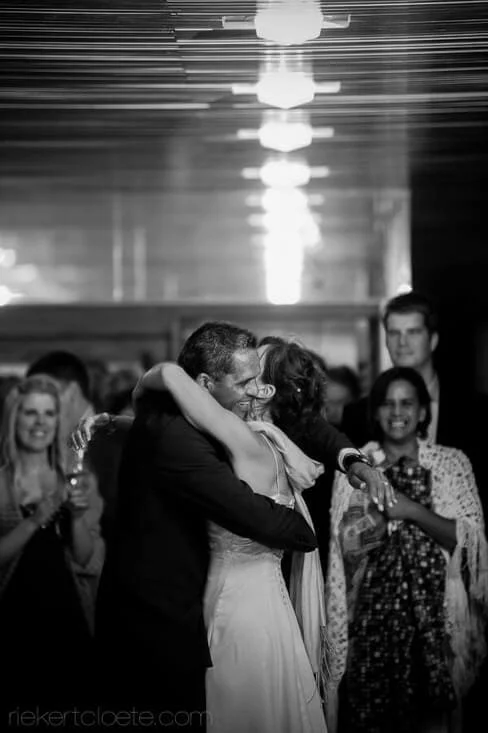 couple embracing dance floor intimate wedding moment