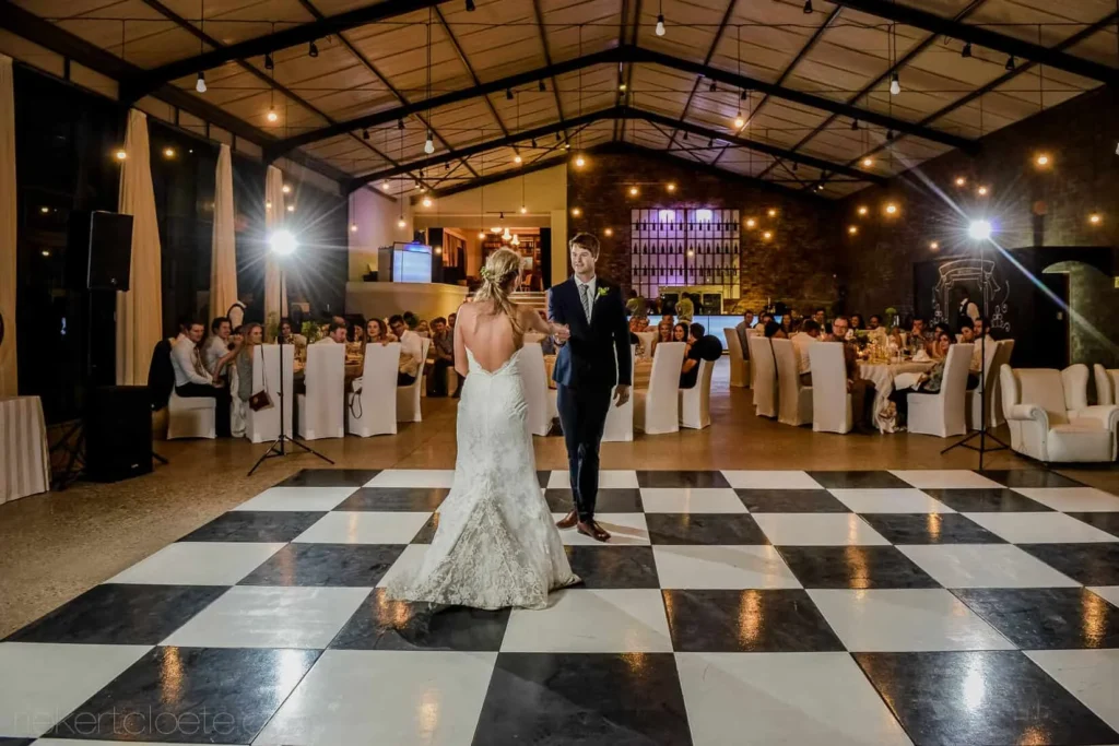 couple first dance checkered floor industrial venue