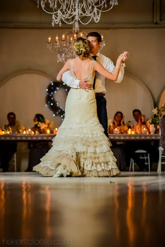 couple first dance elegant ballroom chandelier wide