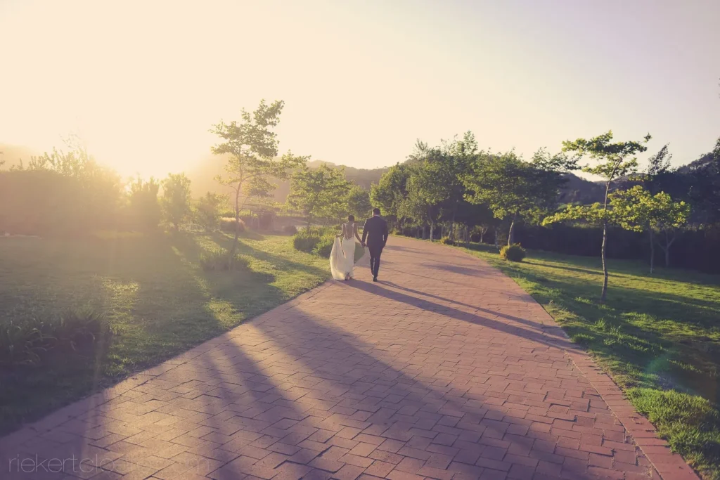 couple garden path golden hour stroll